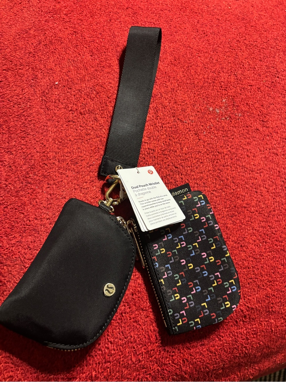 lululemon athletica Dual pouch Wristlet with Multicolor Patterned logo . NWT
